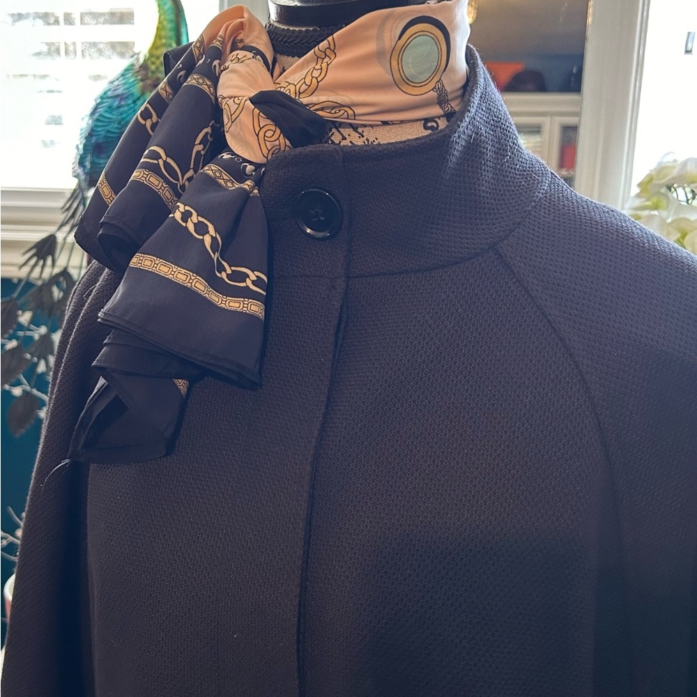 ABSOLUTELY GORGEOUS , black cape, this one is very ELAGANT, in a size 14